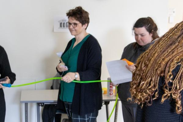 Students participate in a poverty simulation