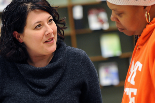 Two women talking to each other