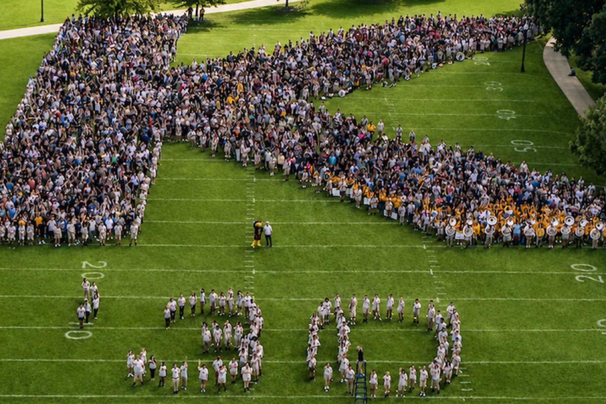 Kent State University’s Class of 2030 forms a K on Centennial Field following Convocation. (Photo credit: Jon Jivan, Kent State University)