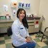 Ayat Husain, a student at 91����'s College of Podiatric Medicine, sits in one of the college's clinic rooms. (Photo credit: Bob Christy)