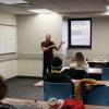 Alumnus Mike Bowen talks with data class