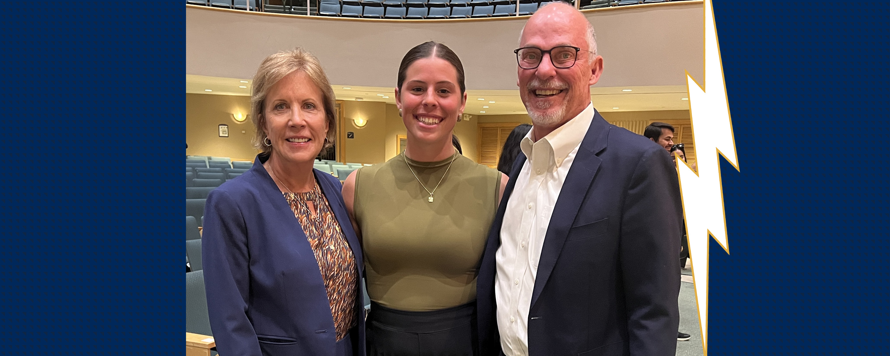 Kent State junior Sydney Davis, a marketing and finance major, is pictured with Kent State business alums Angelo and Joyce Kinicki.