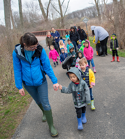 Child Development Center kindergartners walking outside