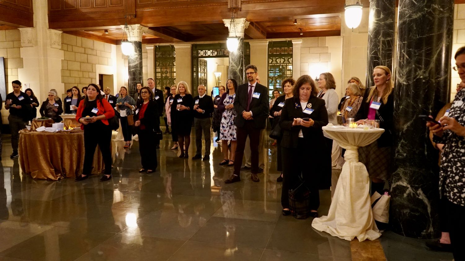 David Hassler, director of ϲ's Wick Poetry Center, is shown at a reception welcoming guests to the performance. 