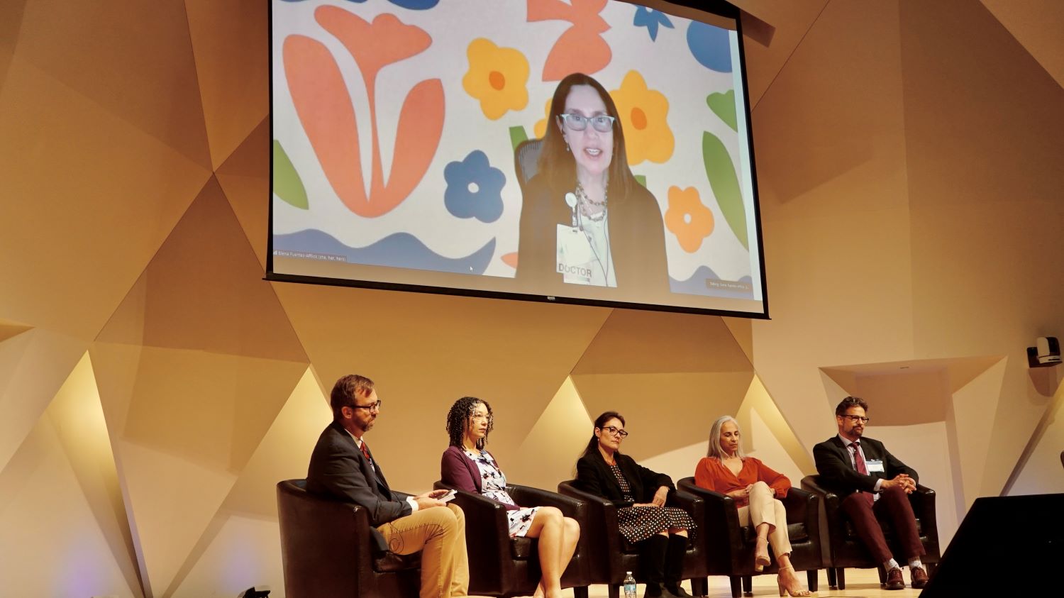 Taryn Burhanna, clinical instructor in 鶹ӰԺ State’s College of Nursing, second from left; Ambre Emory-Maier, associate professor of Dance, second from right; and David Hassler, Wick Poetry Center director, far right, took part in a post-performance talk.